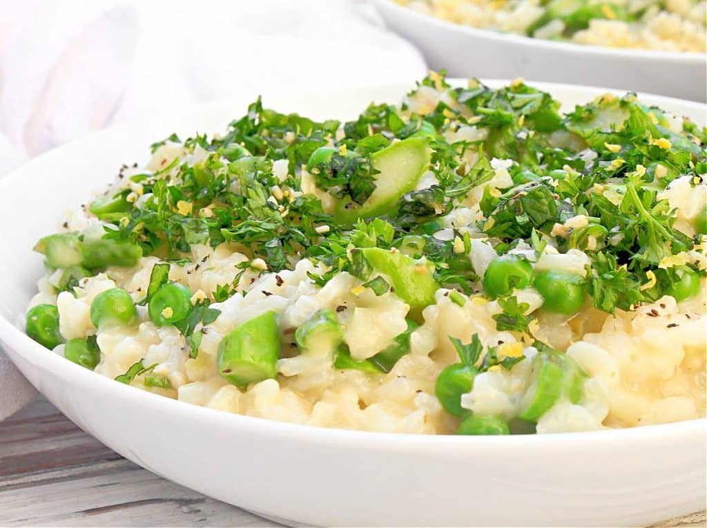 Spring Risotto ~ Bright spring vegetables and creamy risotto topped with garden-fresh herbs. Perfect for Easter and springtime gatherings!