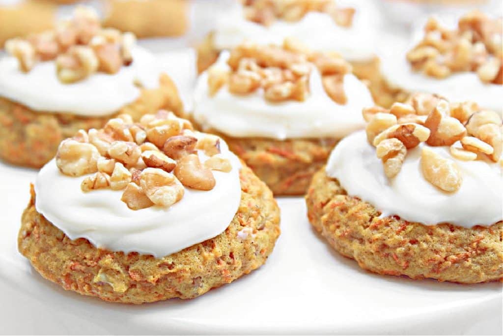 Carrot Cake Cookies ~ All the classic flavors of traditional carrot cake and creamy frosting in a bite-sized indulgence, perfect for Easter brunch!