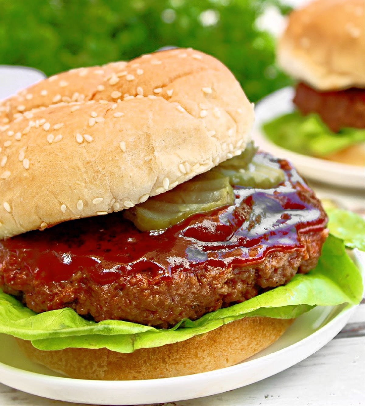 Vegan BBQ Burgers ~ Sauce mixed right into the patties takes these hearty plant-based burgers to the next level of juiciness and flavor!