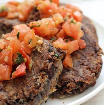 Black Bean Cakes ~ Crisp on the outside and soft on the inside, these cakes are loaded with flavor and easy to make with simple ingredients!