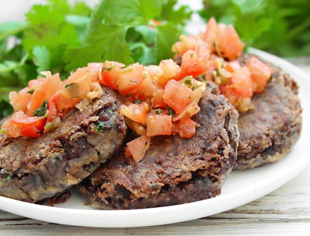 Black Bean Cakes ~ Crisp on the outside and soft on the inside, these cakes are loaded with flavor and easy to make with simple ingredients!
