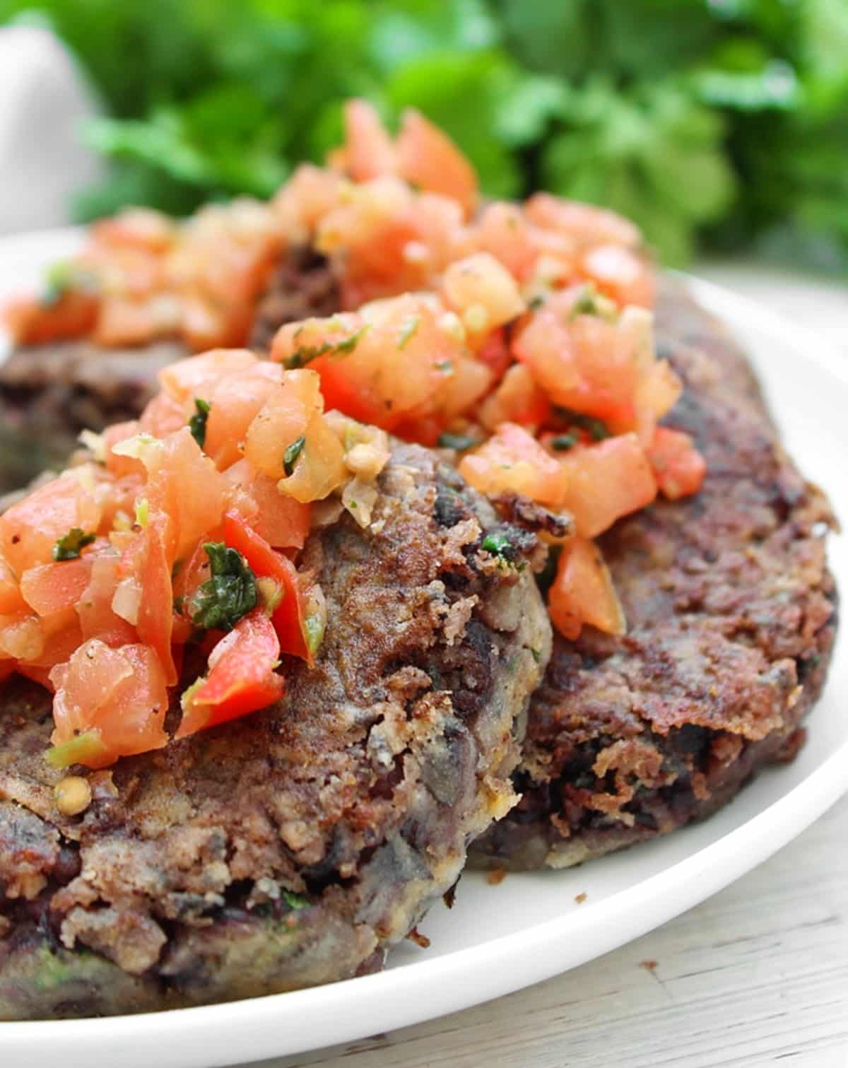 Black Bean Cakes ~ Crisp on the outside and soft on the inside, these cakes are loaded with flavor and easy to make with simple ingredients!