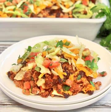 Taco Salad Casserole ~ Everything you love about taco salad in a satisfying and easy-to-make casserole! Ready to serve in about 30 minutes.