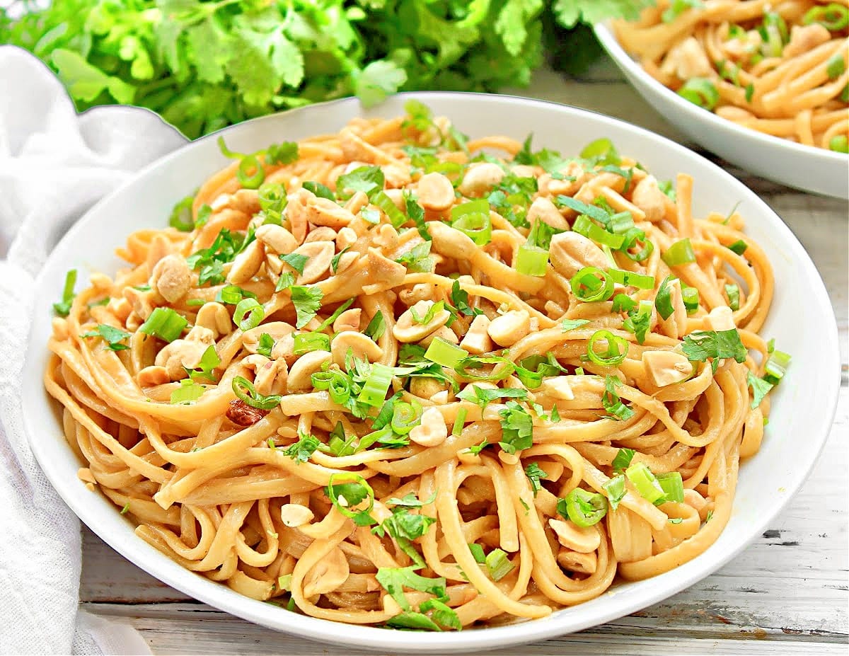 Peanut Butter Noodles ~ Comforting noodles in a creamy Asian-inspired peanut butter sauce. Ready in 30 minutes or less!