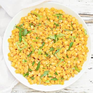 Basil Corn ~ Easy summer side dish made with naturally sweet corn and aromatic fresh basil. Ready to serve in just 10 minutes!
