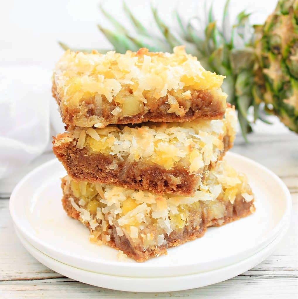 Coconut Pineapple Bars ~ The sweetness of pineapple with the richness of coconut together in an easy sugar cookie bar!
