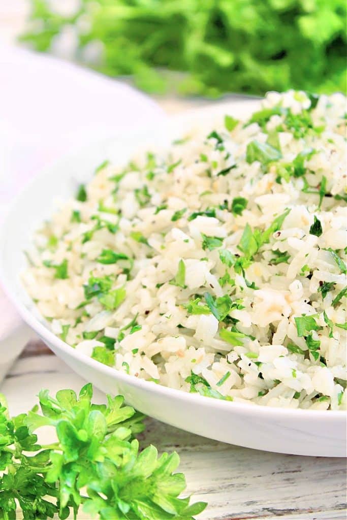 Parsley Rice ~ An easy and versatile side dish made with fresh parsley and garlic butter! Pairs well with a variety of cuisines.