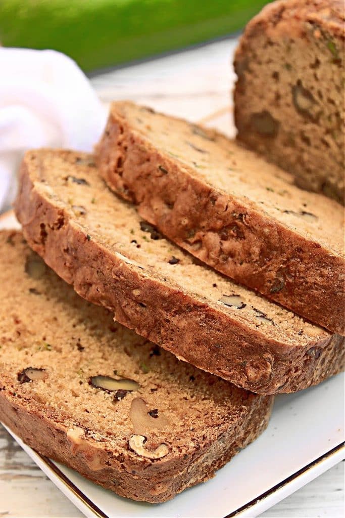 Zucchini Bread ~ A delicious and easy quick bread made with grated zucchini and crunchy walnuts, perfect for breakfast or snacking!