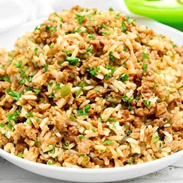 Dirty Rice ~ Bring a taste of New Orleans to the table! This Creole-style dish is packed with strong, spicy, and rich flavors of Louisiana.