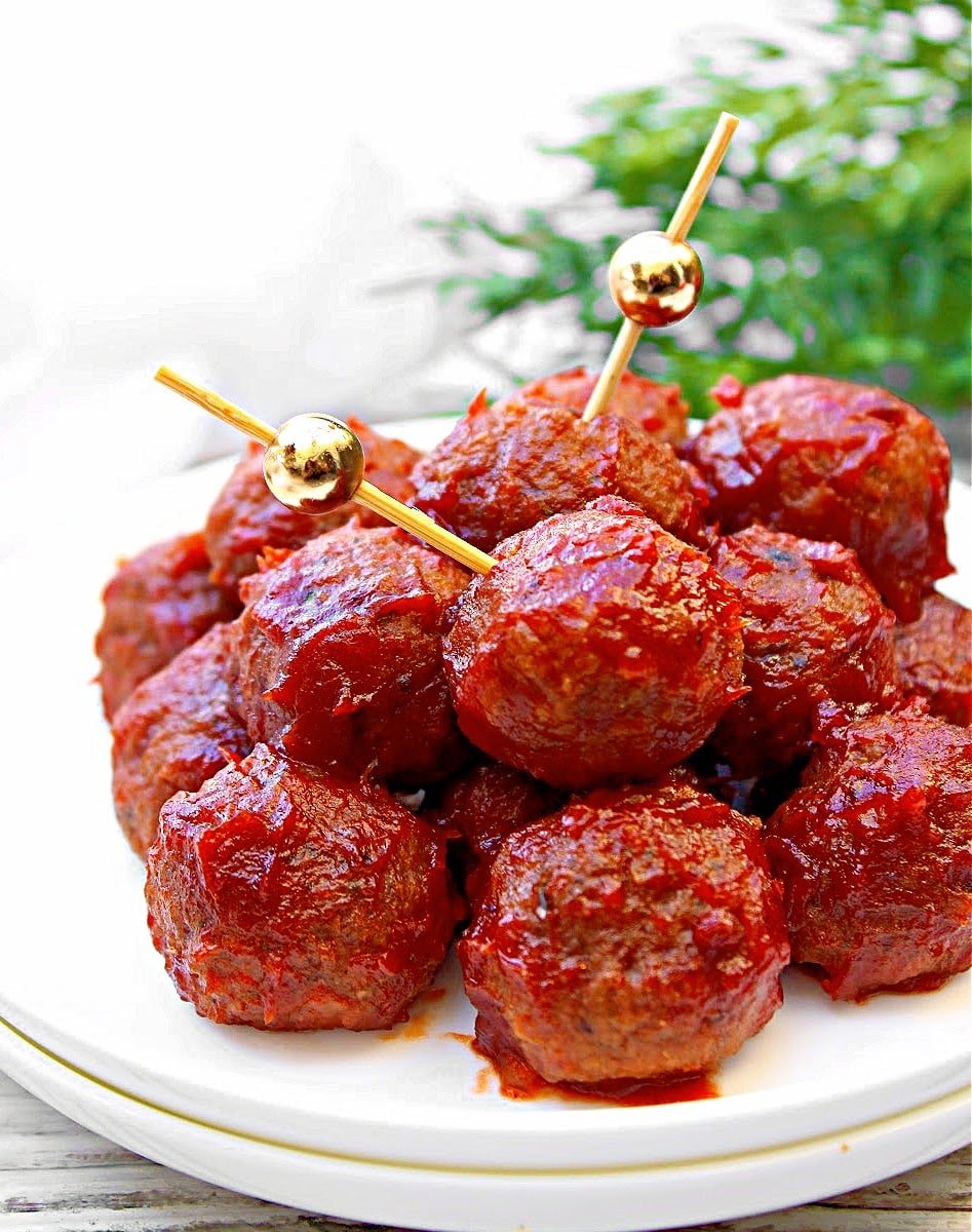 Vegan Cocktail Meatballs ~ Savory bite-sized and plant-based meatballs, perfect for the holiday season! Stovetop and slow cooker options.