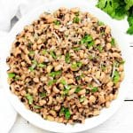 Slow Cooker Black-Eyed Peas ~ Dried beans slow simmered in a seasoned and savory broth. Serve over rice for a simple dinner or with greens and cornbread for good luck on New Year's Day! 