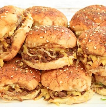 French Onion Sliders ~ Vegan beef sliders with sweet caramelized onions. Serve as an easy weeknight dinner or Game Day snack!