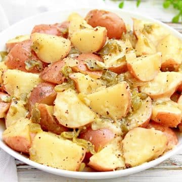 Green Chile Potatoes ~ Easy skillet side dish with cheesy potatoes and smoky green chile peppers. Ready in 20 minutes!