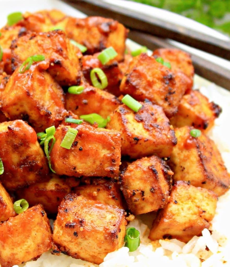 Sriracha Tofu Recipe ~ Baked tofu in spicy sriracha sauce - easy to make with simple ingredients and packed with bold flavor!