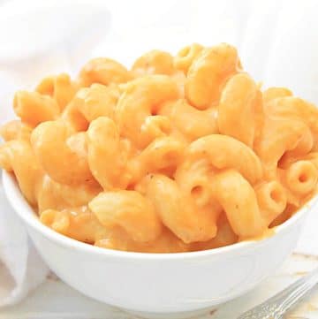 Pumpkin Mac and Cheese ~ Rich and creamy, and perfect for pumpkin season! Nut-free and ready in 20 minutes!
