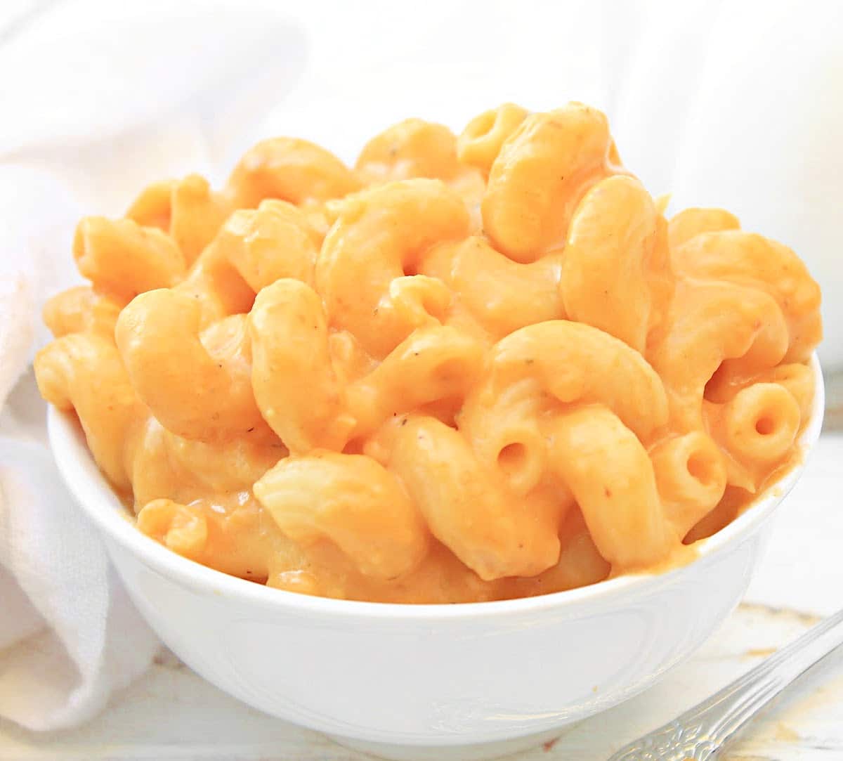 Pumpkin Mac and Cheese ~ Rich and creamy, and perfect for pumpkin season! Nut-free and ready in 20 minutes!