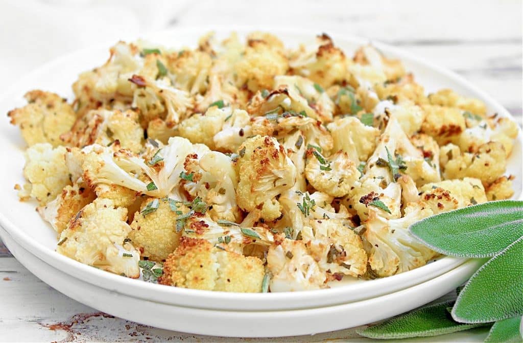 Garlic and Sage Roasted Cauliflower ~ Tender cauliflower with aromatic garlic and fresh sage. Easy low-carb side dish for the holidays!