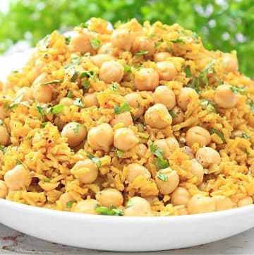 Golden Spiced Chickpea Rice ~ Vibrant and aromatic brown rice dish that combines a warm blend of spices with the nuttiness of chickpeas.