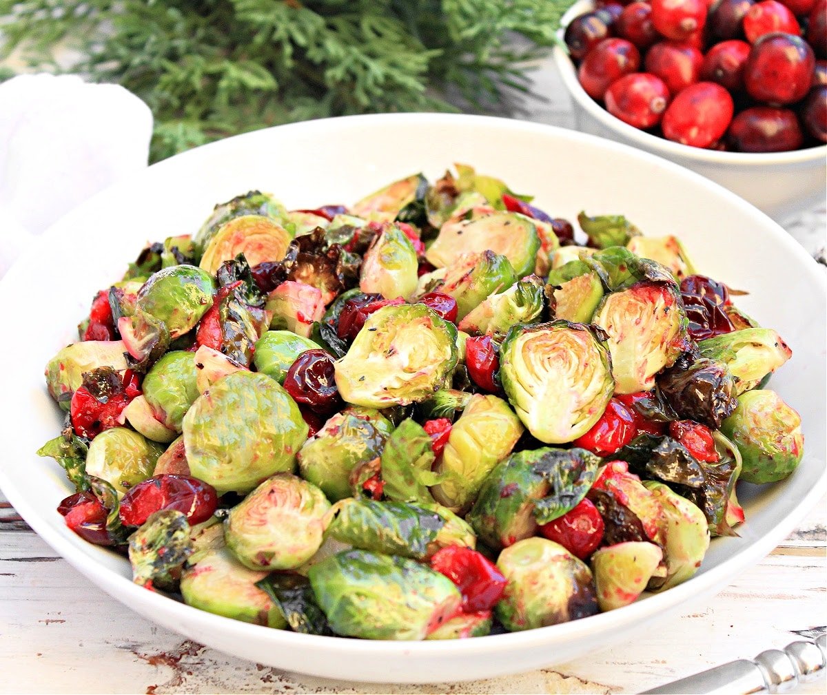 Roasted Cranberry Brussels Sprouts ~ Crispy Brussels sprouts roasted with tangy and sweet cranberries - an easy side dish for the holiday season!