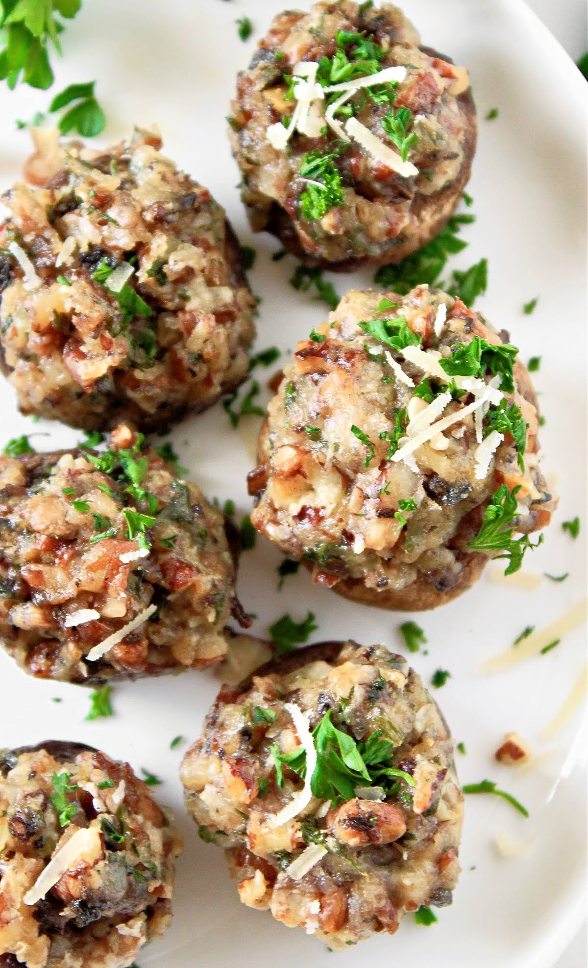 Pecan Stuffed Mushrooms ~ Bite-size vegan or vegetarian appetizer with a savory blend of earthy mushrooms and rich, nutty flavor.