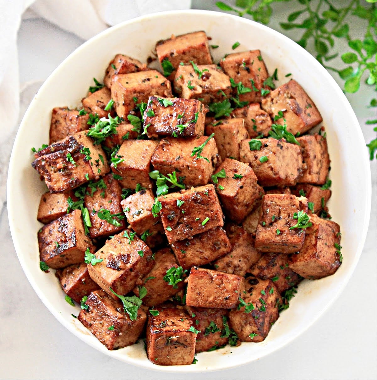 Balsamic Tofu ~ Extra-firm tofu marinated in a savory and tangy sauce then pan-fried until lightly crisp. Easy and perfect for meal prep!