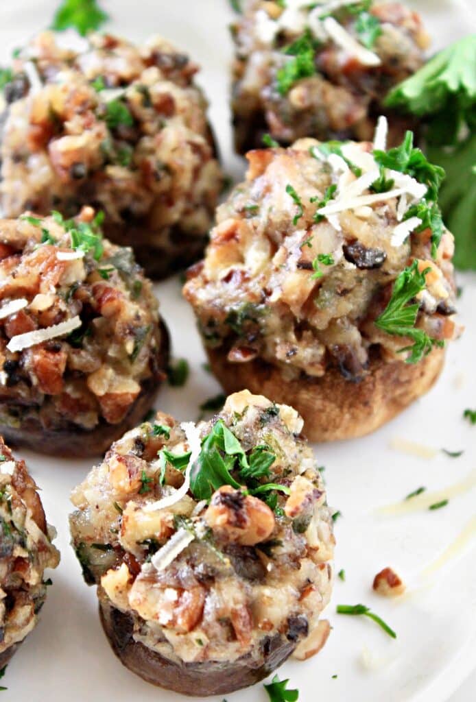 Pecan Stuffed Mushrooms ~ Bite-size vegan or vegetarian appetizer with a savory blend of earthy mushrooms and rich, nutty flavor.