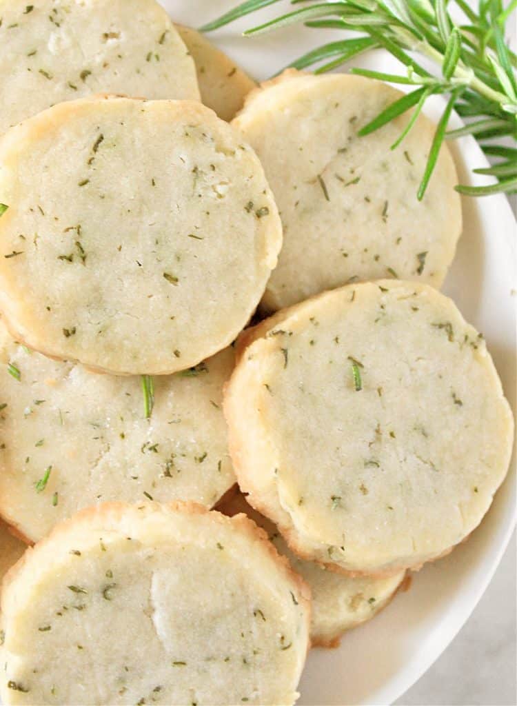 Rosemary Cookies ~ Deliciously buttery shortbread cookies studded with fresh rosemary. Easy to make and perfect as a savory treat with hot tea!