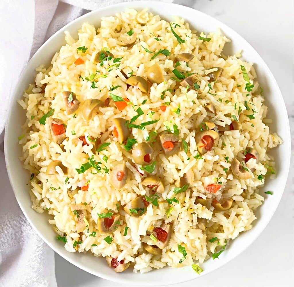 Green Olive Saffron Rice ~ Simple yet exotic side dish combining rich saffron with briny Spanish green olives, and the aromatic touch of long-grain white rice.