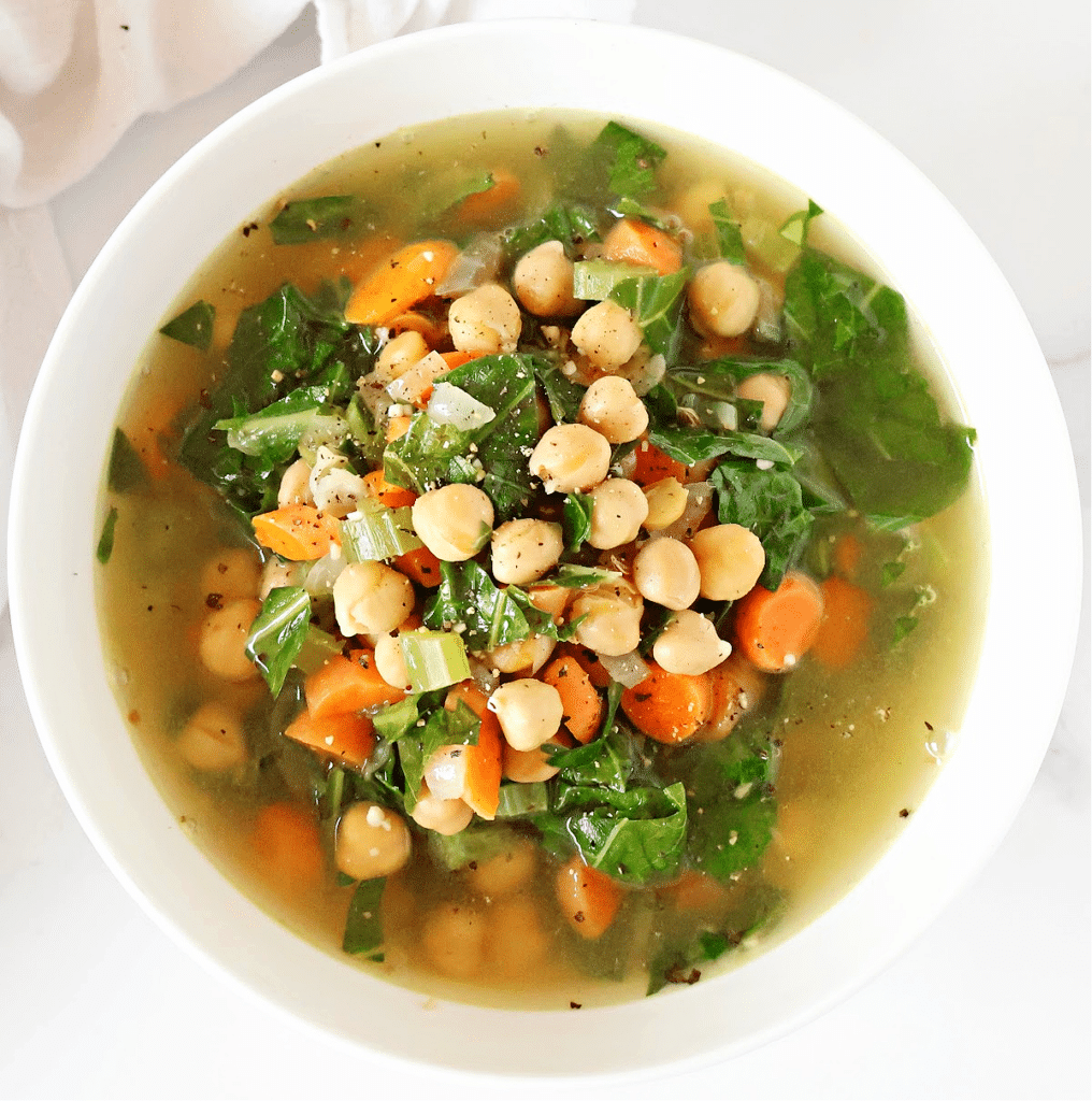 Chickpea and Collard Greens Soup – a quick and flavorful delight featuring tender chickpeas, vibrant collard greens, and aromatic spices in a savory broth. Ready in just 20 minutes, it's a wholesome and time-friendly choice for a delicious and comforting meal.