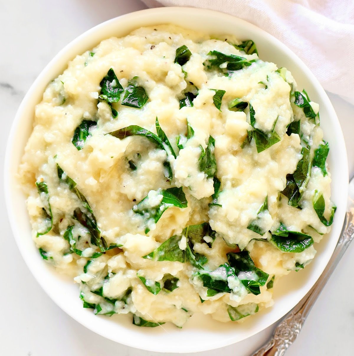 Grits and Greens Casserole ~ Cheesy grits and greens are perfect for holidays and bring a taste of the South to the table any time of year!