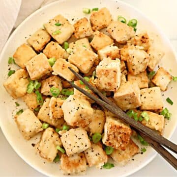 Salt and Pepper Tofu ~ Crispy tofu that has been marinated in a savory brine then seasoned with salt and the earthy flavor of white pepper.