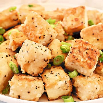 Salt and Pepper Tofu ~ Crispy tofu that's been marinated in a savory brine, then seasoned with salt and the earthy flavor of white pepper.