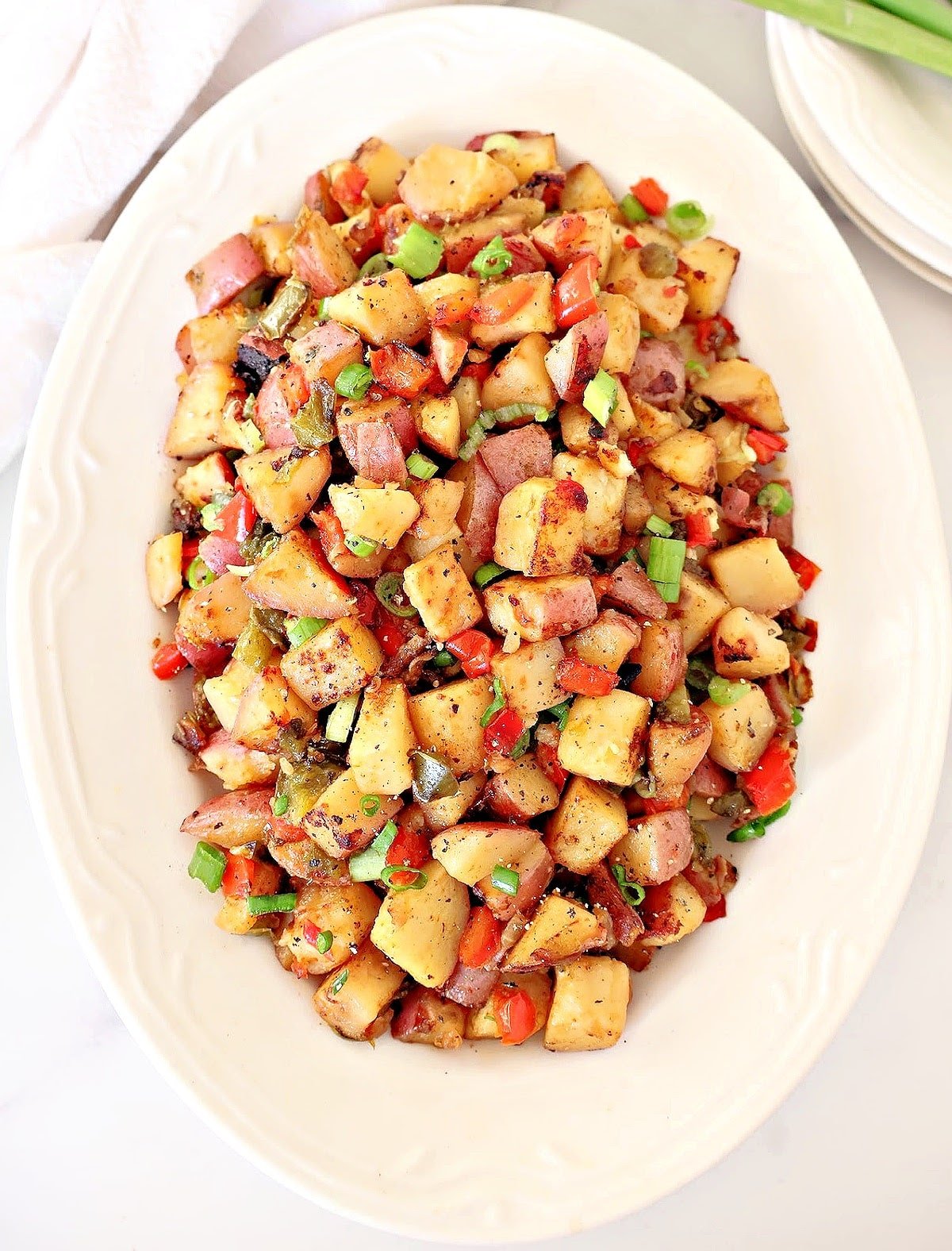 Potatoes O'Brien ~ Easy and classic Irish side dish with crispy potatoes, red and green bell peppers and onions.