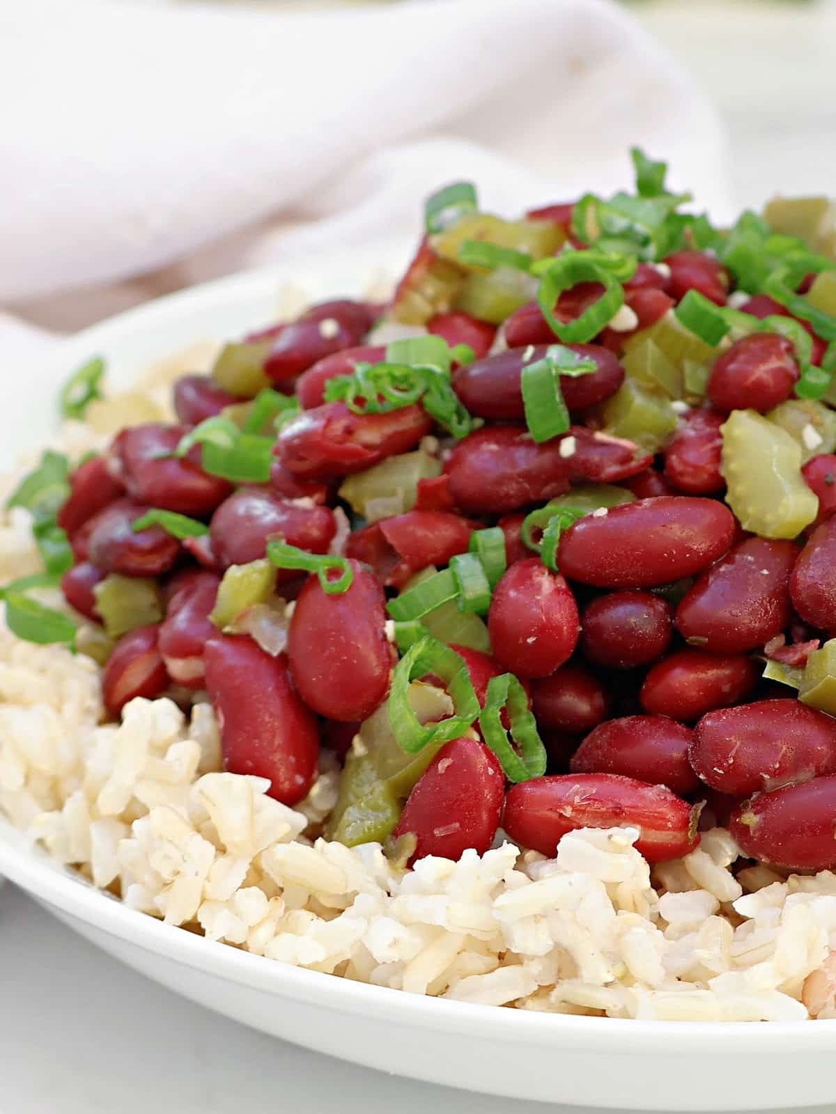 Red Beans and Brown Rice ~ Easy Creole-spiced dish with protein-packed red beans, aromatic vegetables, and wholesome brown rice.