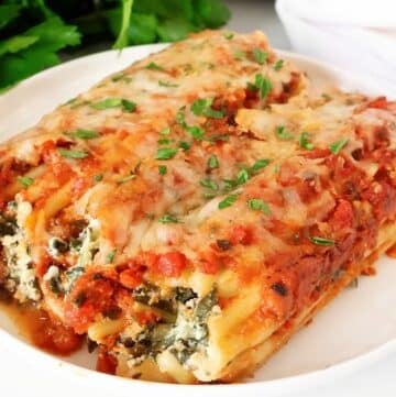 Spinach Manicotti ~ A rich and satisfying plant-based version of the classic Italian pasta dish. Easy no-boil recipe!