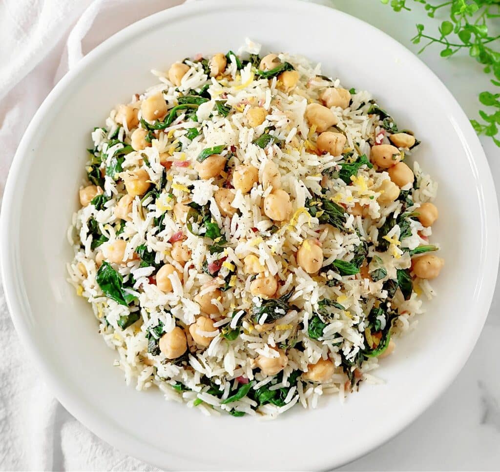 Chickpea Spinach Rice ~ Simple and flavorful rice dish featuring chickpeas, fresh spinach, zesty lemon, and aromatic dill.