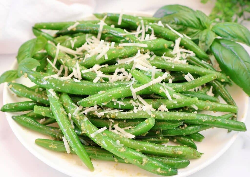 Green Beans with Pesto ~ Easy Recipe ~ Fresh green beans tossed with homemade basil pesto. Ready in minutes!