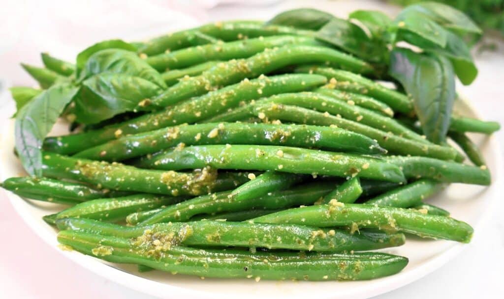 Green Beans with Pesto ~ Easy Recipe ~ Fresh green beans tossed with homemade basil pesto. Ready in minutes!