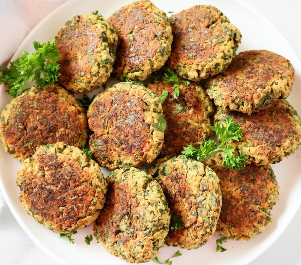 Baked Falafel ~ Easy oven-baked falafel made with a flavorful mixture of chickpeas, fresh herbs, and aromatic spices. Vegan and vegetarian.