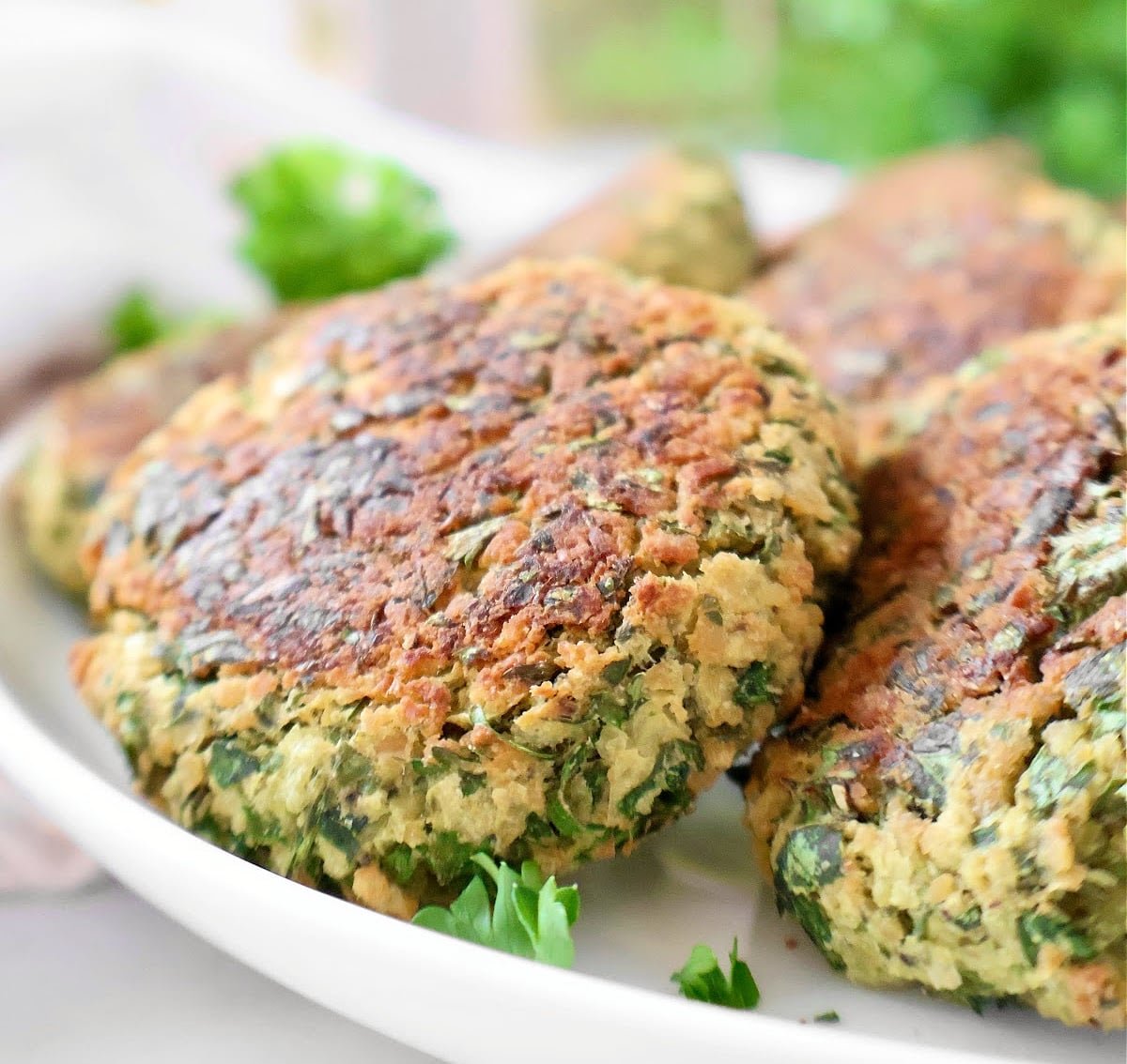 Baked Falafel ~ Easy oven-baked falafel made with a flavorful mixture of chickpeas, fresh herbs, and aromatic spices. Vegan and vegetarian.