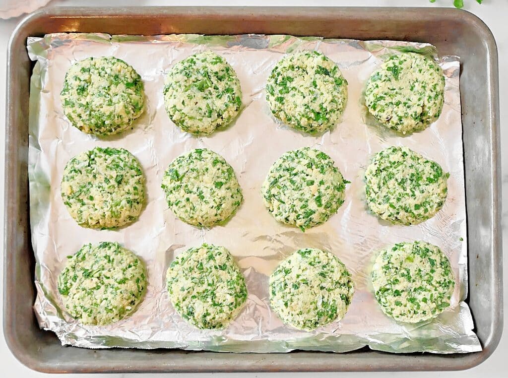 Baked Falafel ~ Easy oven-baked falafel made with a flavorful mixture of chickpeas, fresh herbs, and aromatic spices. Vegan and vegetarian.