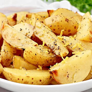 Lemon Roasted Potatoes ~ Crisp golden potatoes with a tangy blend of fresh lemon and savory fresh herbs. Easy side dish for Easter brunch!