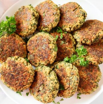 Baked Falafel ~ Easy oven-baked falafel made with a flavorful mixture of chickpeas, fresh herbs, and aromatic spices. Vegan and vegetarian.