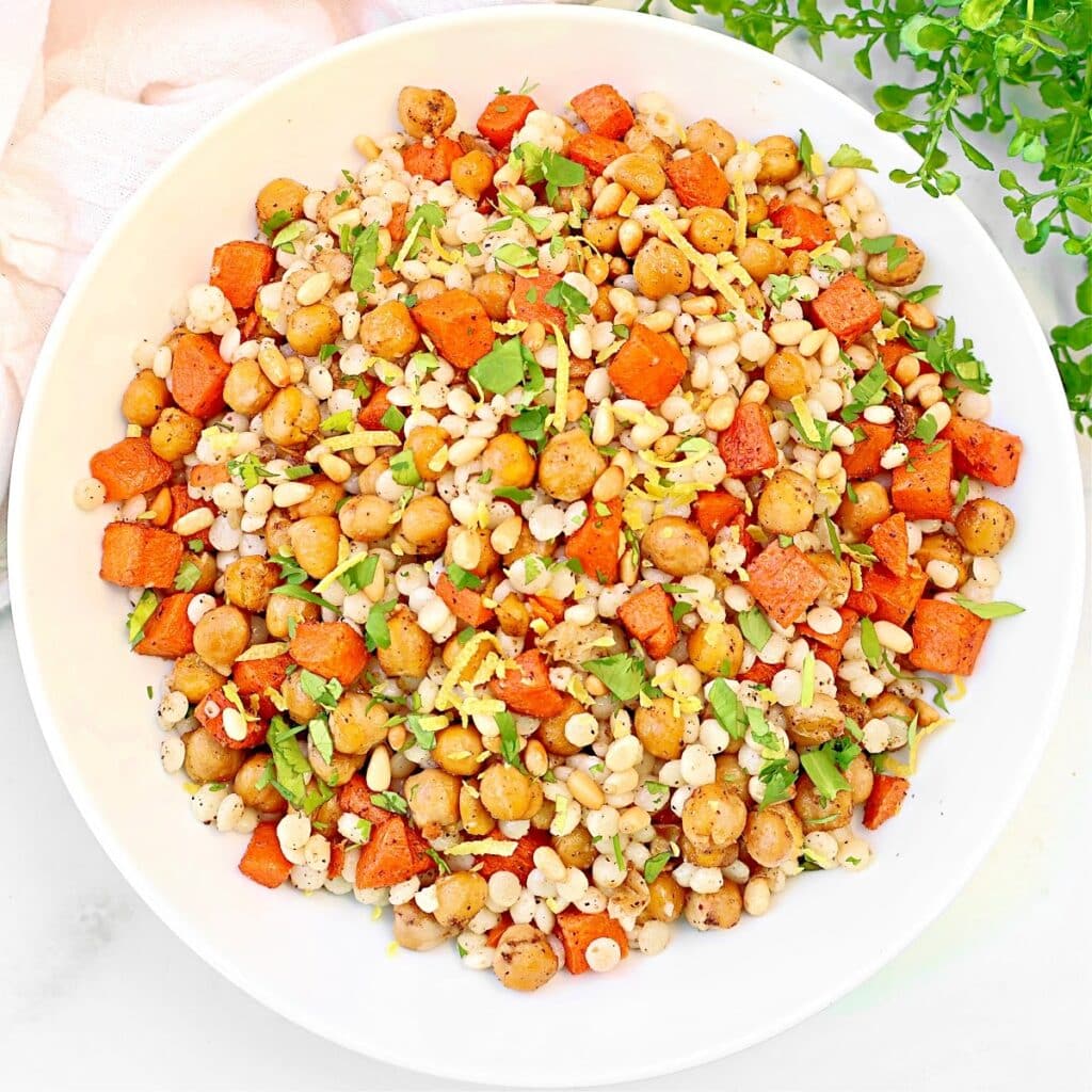 Baharat Chickpea Couscous ~ Pearl couscous with roasted chickpeas, carrots, and a warm blend of Middle Eastern spices.