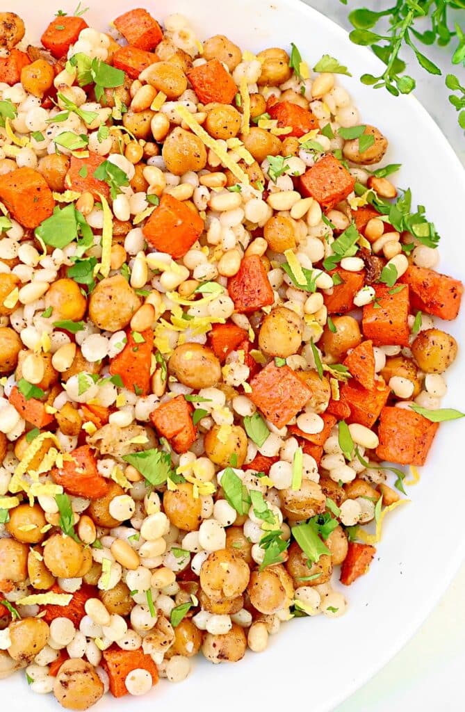 Baharat Chickpea Couscous ~ Pearl couscous with roasted chickpeas, carrots, and a warm blend of Middle Eastern spices.