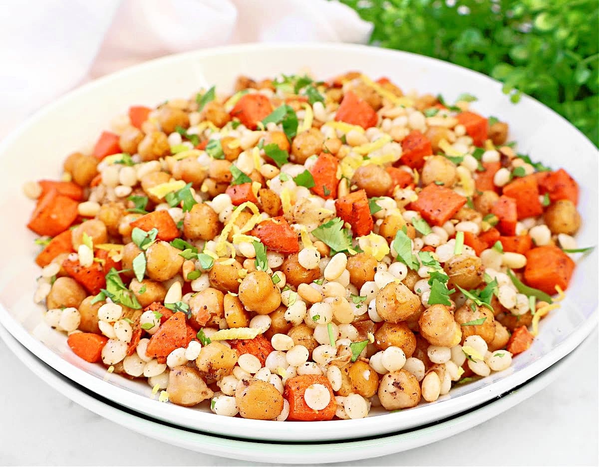 Baharat Chickpea Couscous ~ Pearl couscous with roasted chickpeas, carrots, and a warm blend of Middle Eastern spices.