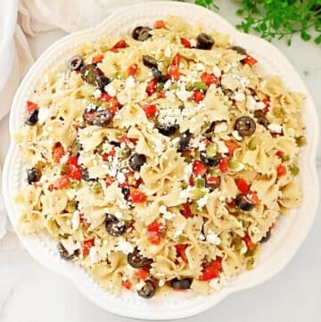 Greek Pasta Salad for a Crowd ~ Easy make ahead side dish with tender pasta, fresh veggies, tangy olives, and creamy feta cheese.