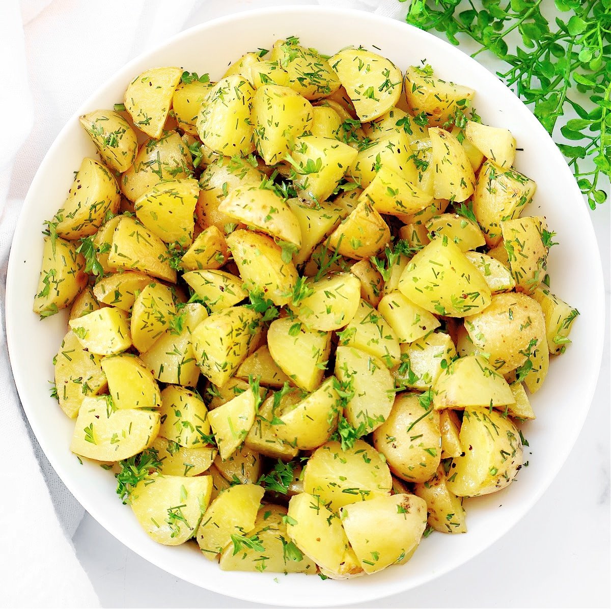 Fresh Herb Potato Salad ~ Roasted potatoes with simple seasonings and garden-fresh herbs. Naturally vegan.