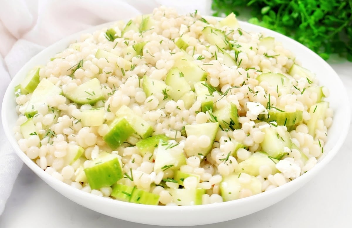 Cucumber Couscous Salad ~ Pearled couscous salad with crisp cucumber, fresh dill, and tangy feta tossed in zesty Italian dressing.