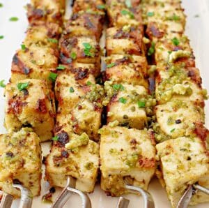 Grilled Pesto Tofu ~ Easy recipe for extra firm tofu marinated in Homemade Basil Pesto and grilled to perfection! Vegetarian and Vegan.